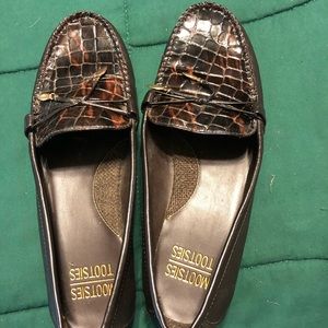Woman’s brown loafers